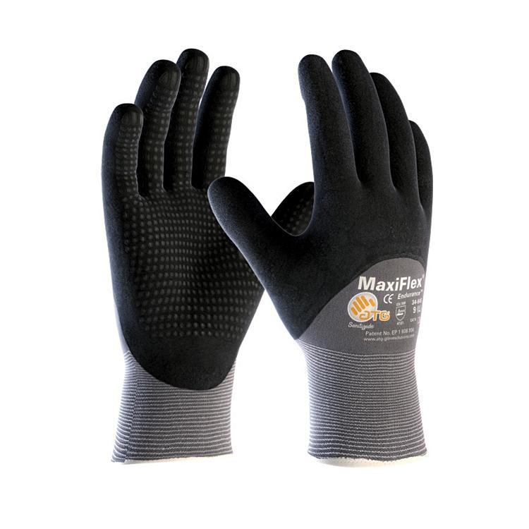 Schwarzdunkelgraue MaxiFlex Endurance Arbeitshandschuhe mit genoppter Handfläche für bessere Griffigkeit und längere Lebensdauer. Atmungsaktiv, mit 3/4-Nitril-Mikroschaumbeschichtung und hellgrauen, gerippten Bündchen.