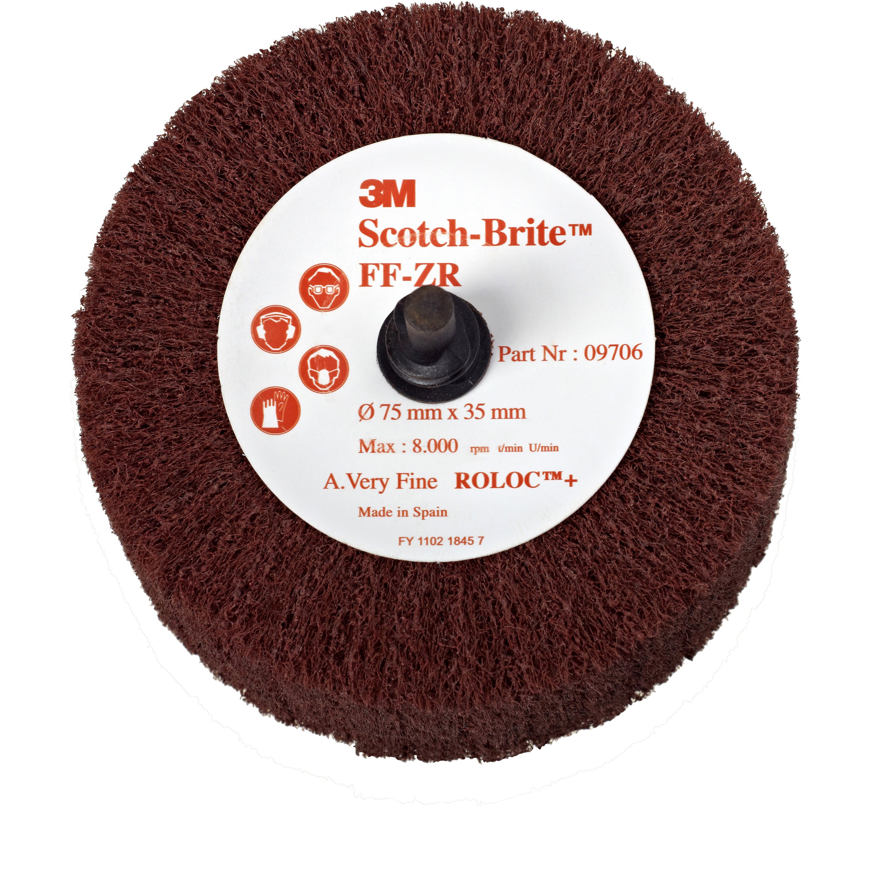 Runde, braune 3M Scotch-Brite Grobreinigungsbürste mit fein strukturierter, faseriger Oberfläche und schwarzem Mittelschaft. Weißes Etikett: FF-ZR, 75 x 35 mm, Sicherheitssymbole für Augen, Ohren, Hände. Ideal für Schweißnähte und Oberflächen.